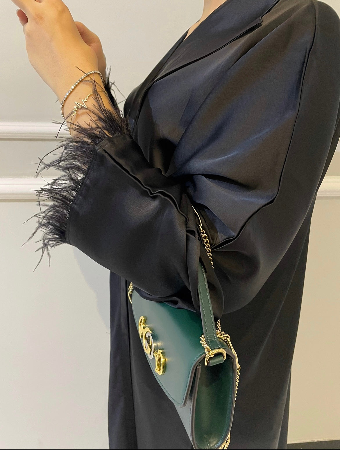 Abaya Dubaï noire à plumes