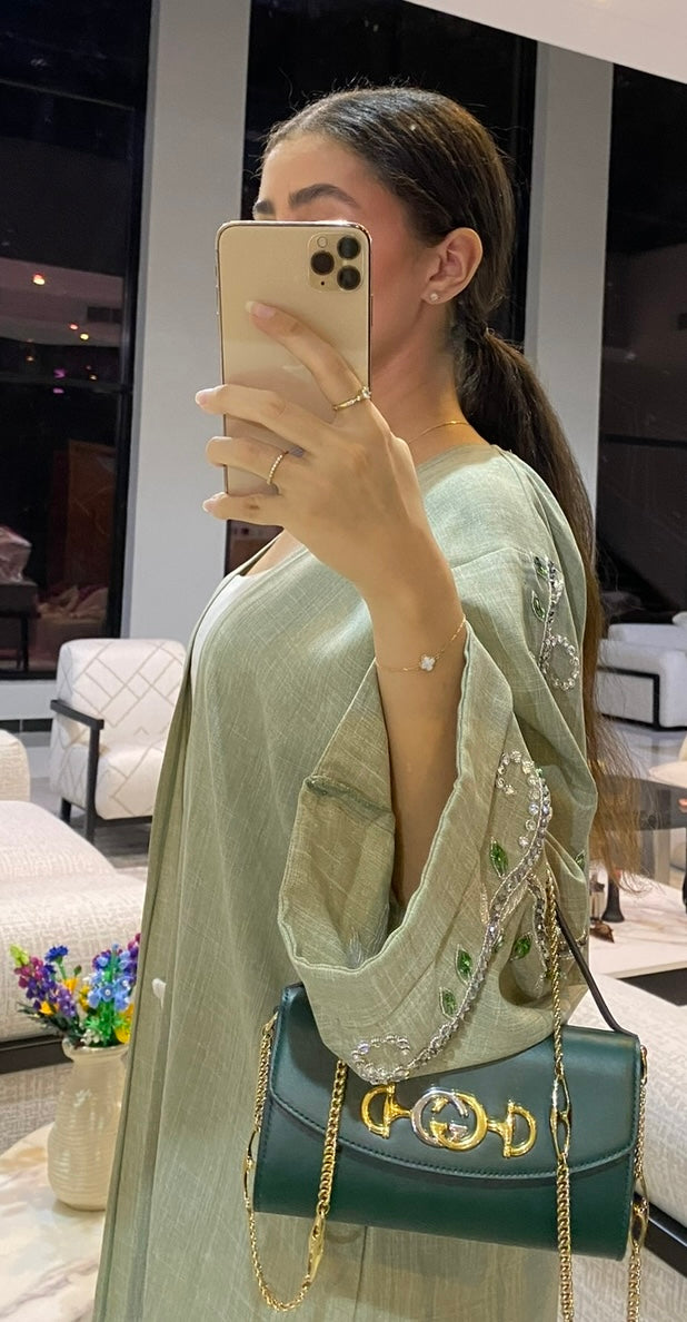 Abaya Dubaï verte manches ornées de perles