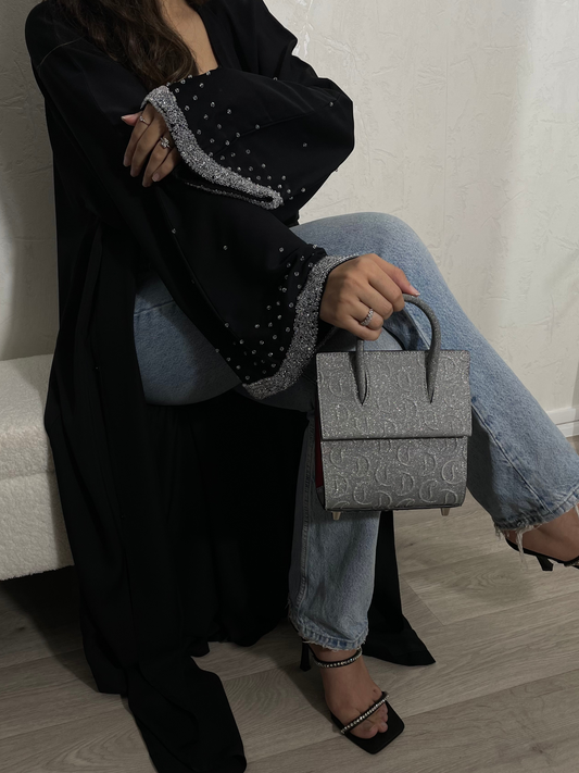 Abaya Dubaï noire manches ornées de perles 