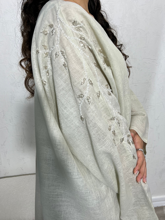 Abaya Dubaï blanc cassé/beige en lin à perles