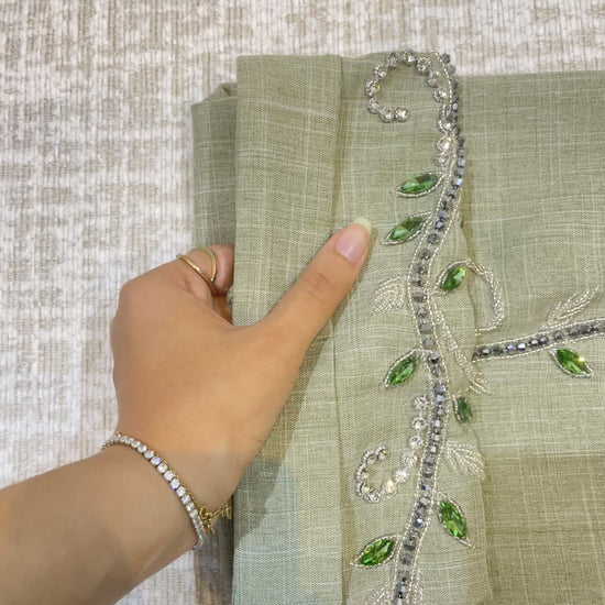 Abaya Dubaï verte manches ornées de perles 